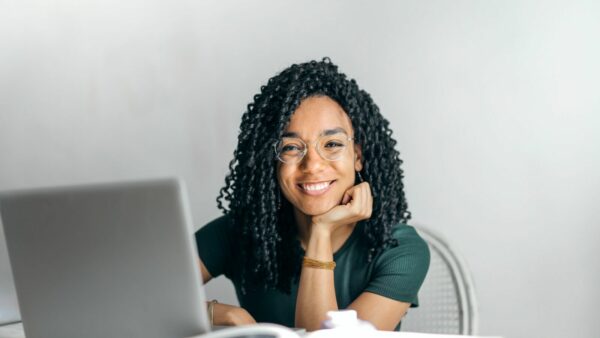 ADHD coach behind her laptop